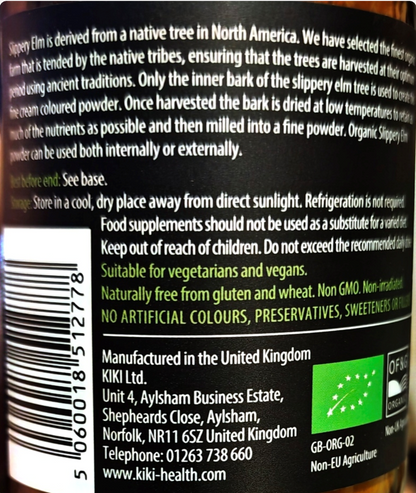 Close-up of the back of a KIKI Health product label showing product information, a barcode, ingredients text, and a green organic certification logo on a dark background.