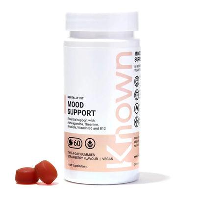 "Front view of Known Mood Mushrooms Gummies VEGAN, 60-count bottle with a couple of gummies around it."
