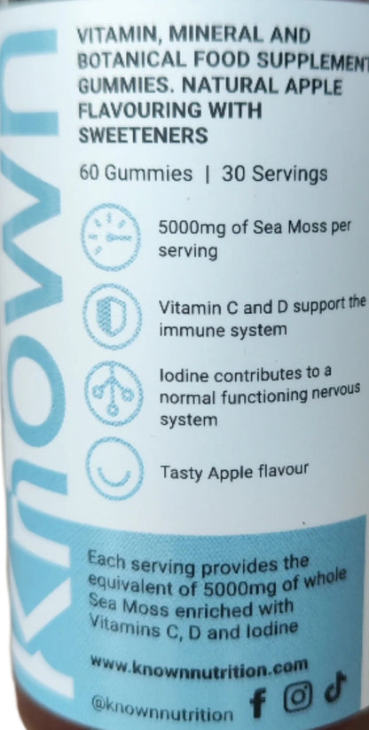 Front view of Known Sea Moss Gummies VEGAN, 60-count bottle with a couple of gummies around it-6