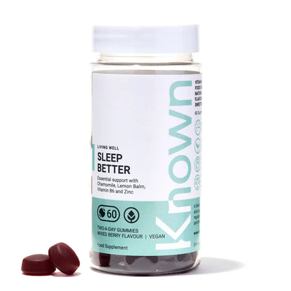  "Front view of Known Sleep Better Gummies VEGAN, 60-count bottle with a couple of gummies around it."
