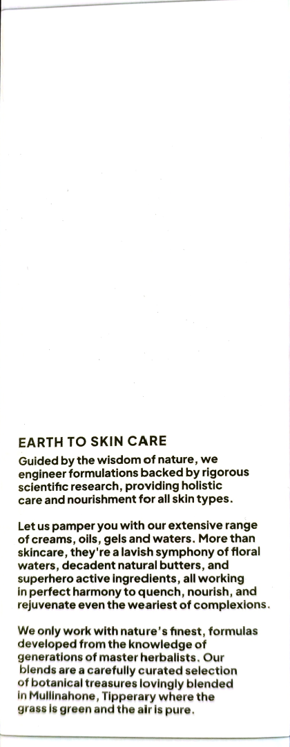 A close-up of a printed page with black text on a white background, headed 'EARTH TO SKIN CARE' and several paragraphs of copy describing a skincare brand and product range.