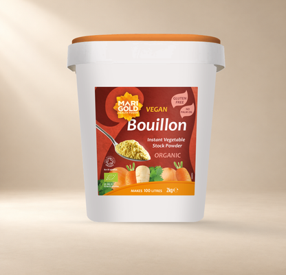 Marigold Organic Vegan Vegetable Bouillon Powder – 2kg – front of authentic 2kg tub on warm cream background