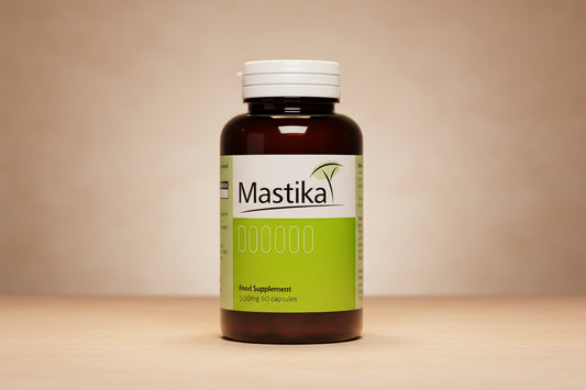 Mastika food supplement bottle with green label on a white background