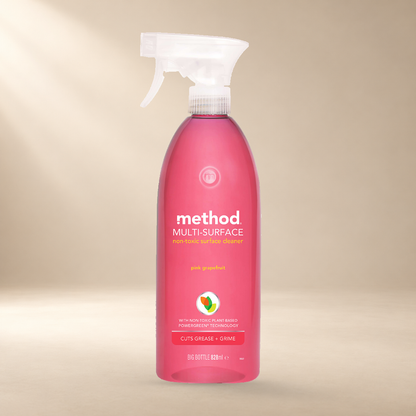 Method Multi-Surface Cleaner – Pink Grapefruit 828ml – authentic product on warm cream studio background
