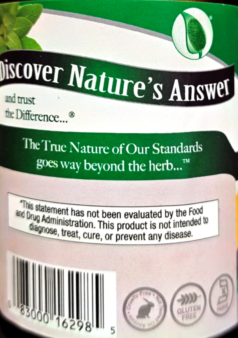Close-up of a supplement bottle label reading 'Discover Nature's Answer' with a barcode, dietary icons, and a green-and-white design.