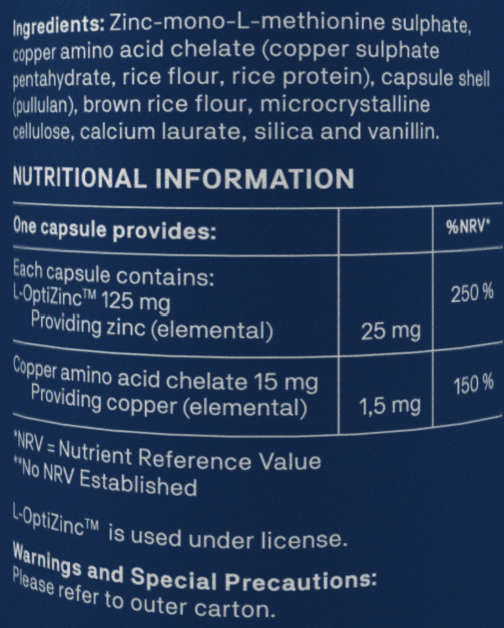 A close-up of a dark blue product label showing ingredients and nutritional information for a supplement capsule. Visible text includes 'Ingredients:' and 'NUTRITIONAL INFORMATION' with details about L-OptiZinc and copper amino acid chelate.