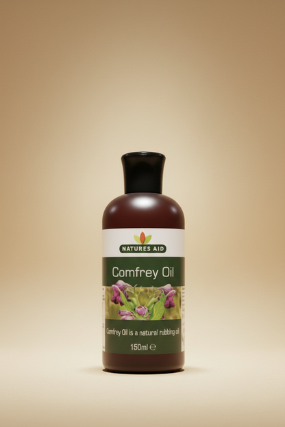 Bottle of Natures Aid Comfrey Oil on a beige background