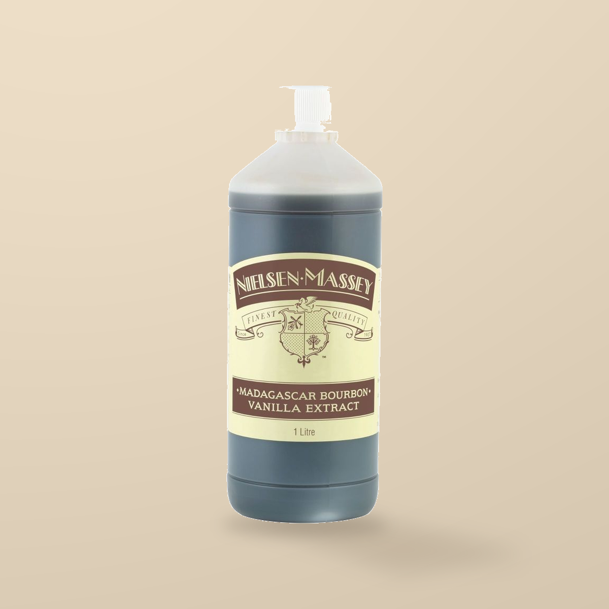 Nielsen-Massey Madagascar Bourbon Vanilla Extract – 1L — original product packaging on warm beige background