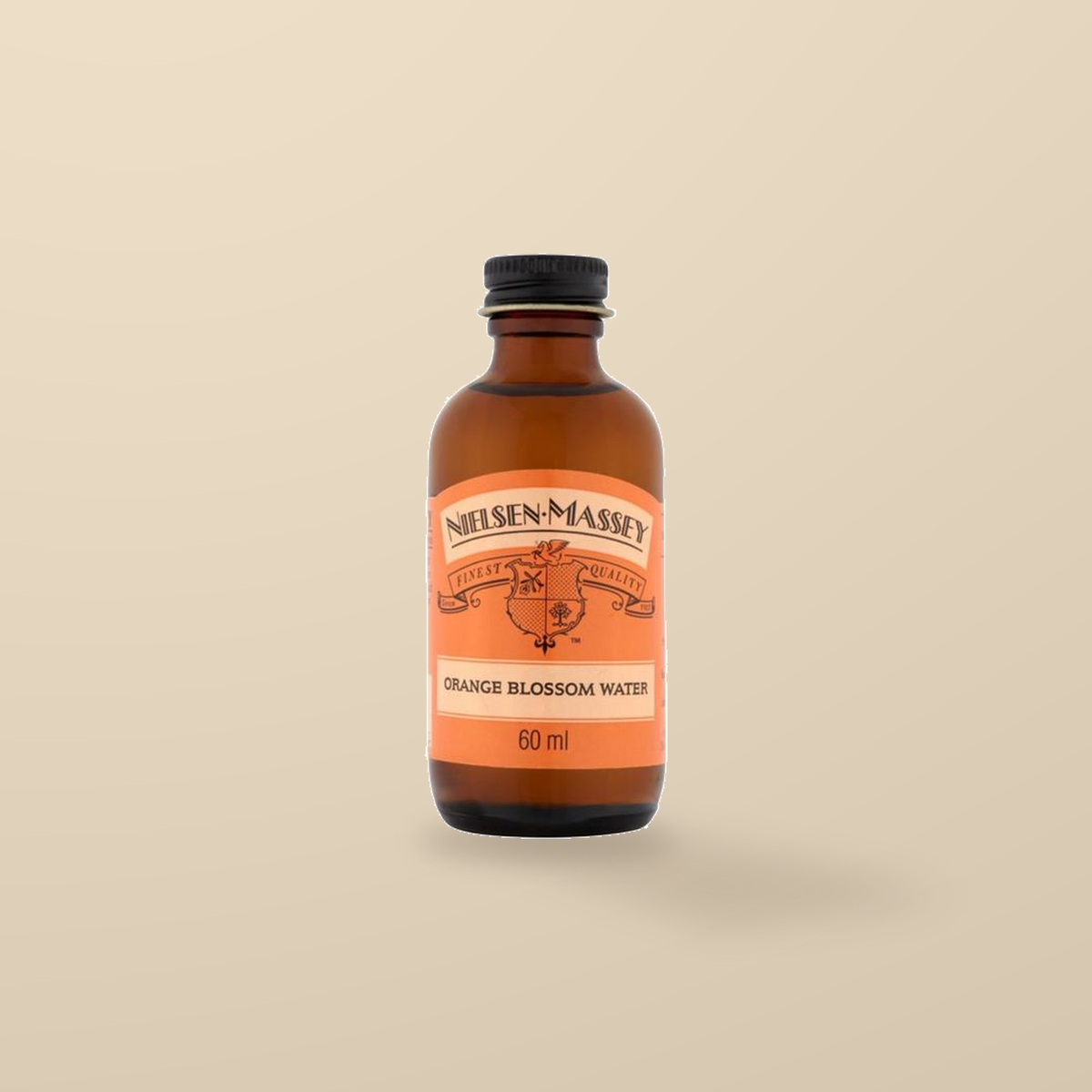 Nielsen-Massey Orange Blossom Water – 60ml — original product packaging on warm beige background