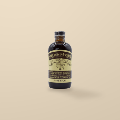 Nielsen-Massey Organic Madagascar Bourbon Vanilla Extract – 118ml — original product packaging on warm beige background