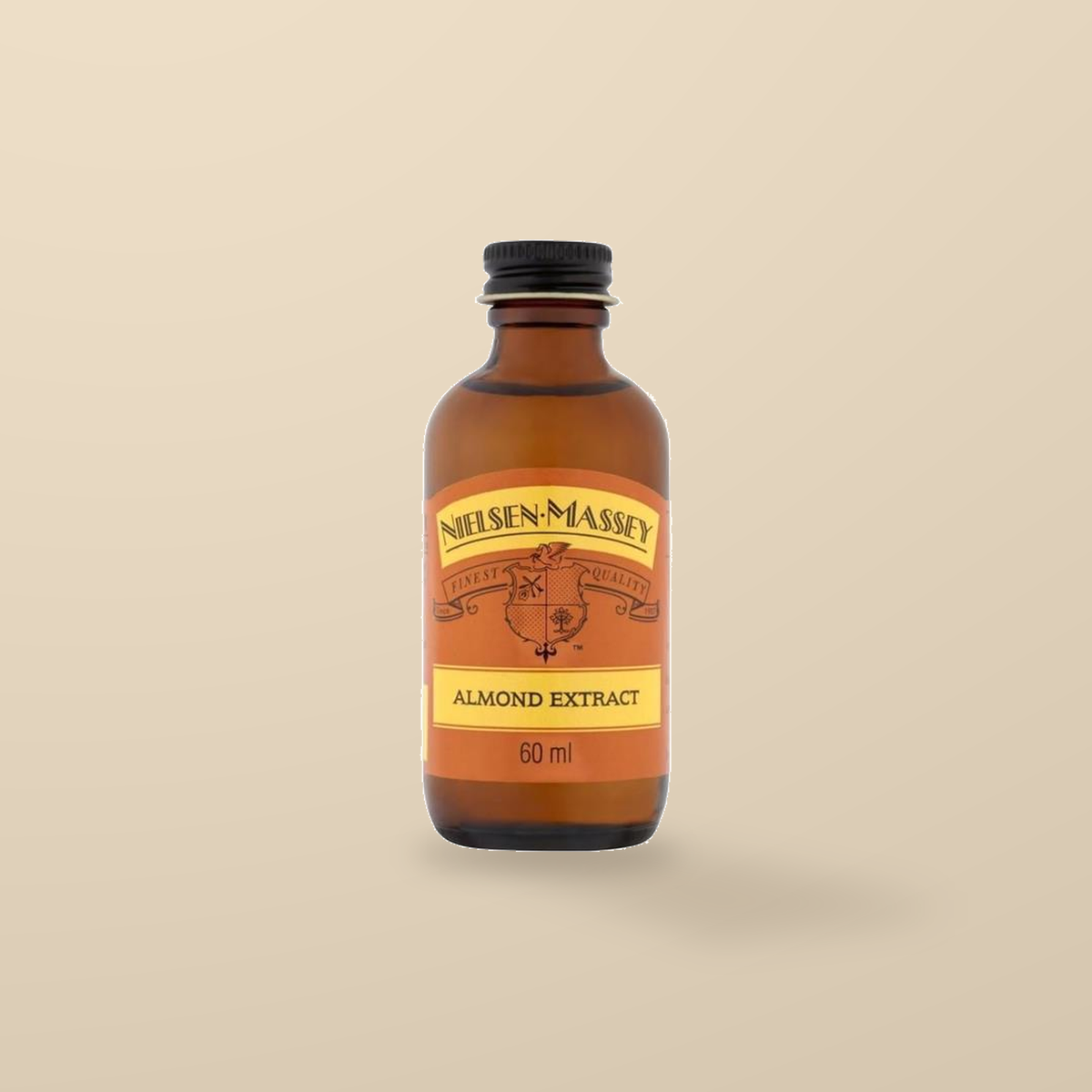 Nielsen-Massey Pure Almond Extract – 60ml — original product packaging on warm beige background
