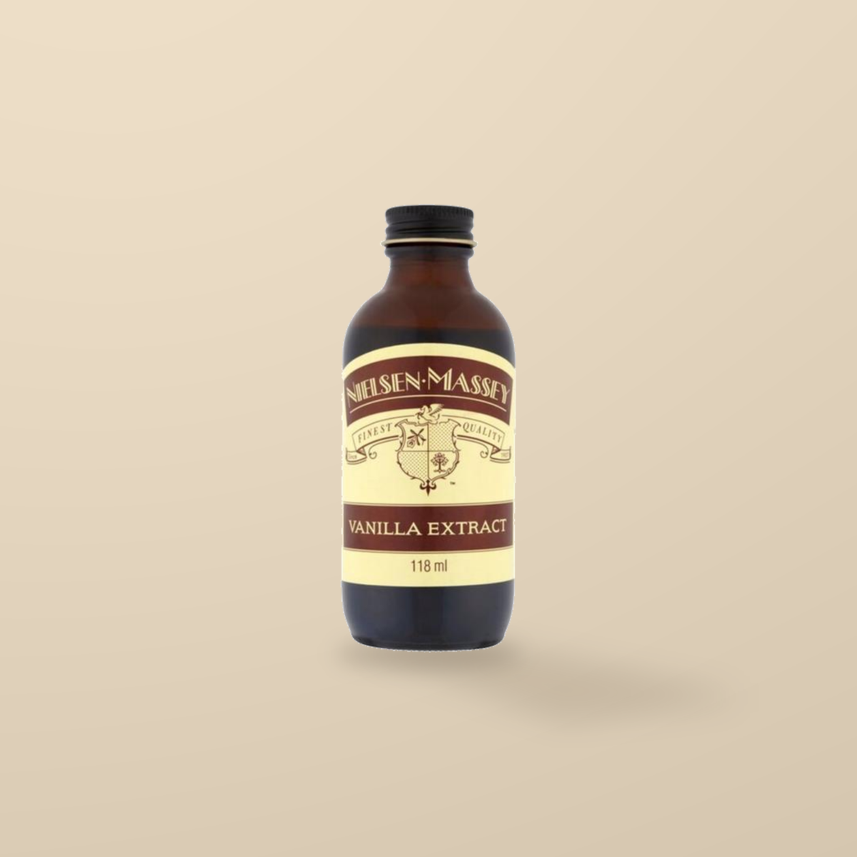 Nielsen-Massey Pure Vanilla Extract – 118ml — original product packaging on warm beige background