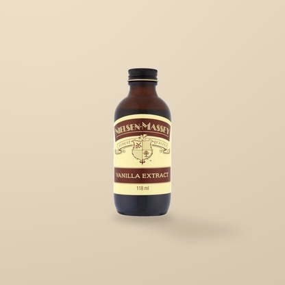 Nielsen-Massey Pure Vanilla Extract – 118ml — original product packaging on warm beige background