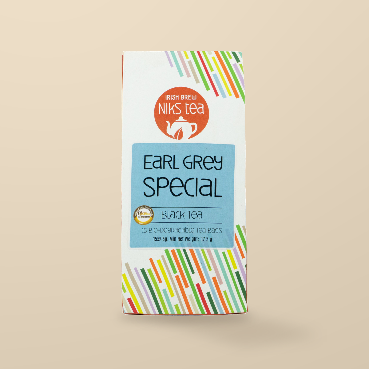 Niks Tea Earl Grey Special Black Tea with Cornflowers – 15 Tea Bags original product packaging on warm beige studio background