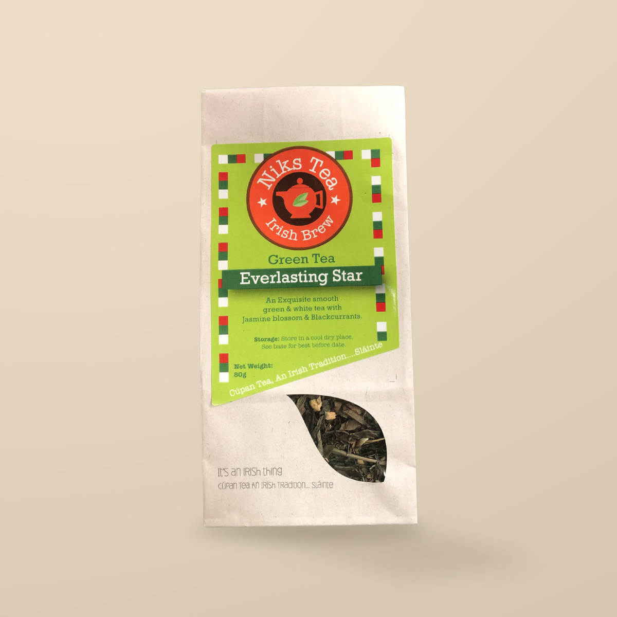 Niks Tea Everlasting Star Green & White Loose Tea – 80g original product packaging on warm beige studio background