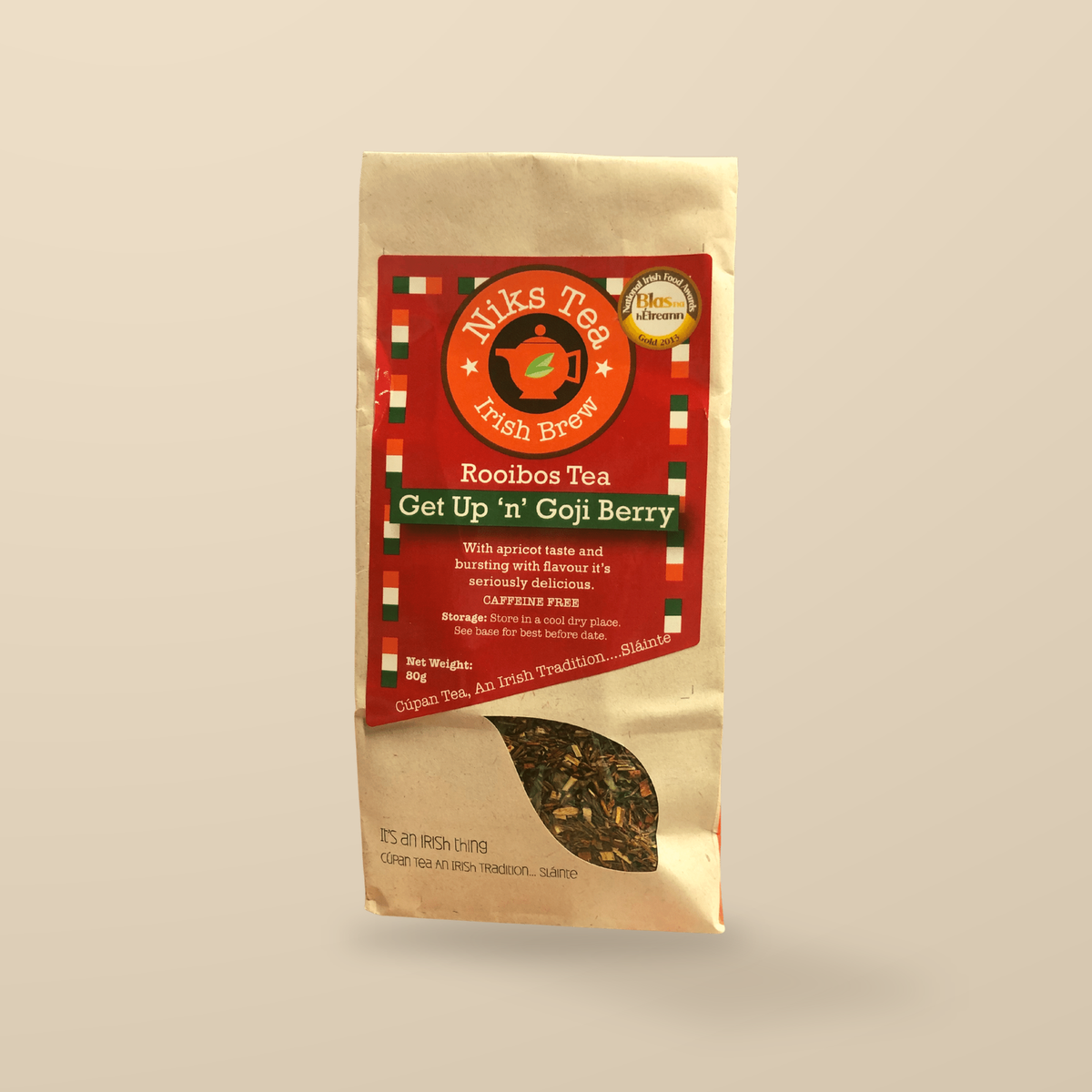 Niks Tea Get Up & Goji Berry Rooibos Loose Tea – 80g original product packaging on warm beige studio background