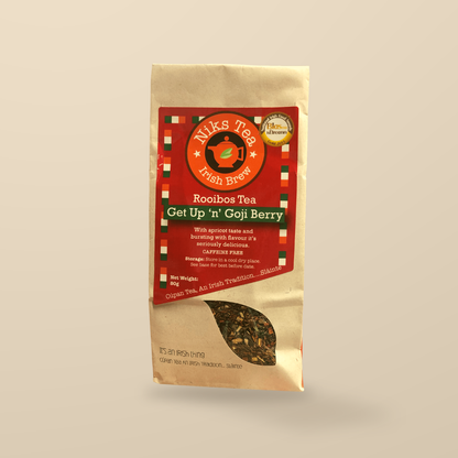 Niks Tea Get Up & Goji Berry Rooibos Loose Tea – 80g original product packaging on warm beige studio background