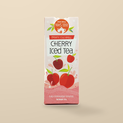 Niks Tea Organic Cherry Cold Brew Iced Tea – 8 Tea Bags original product packaging on warm beige studio background