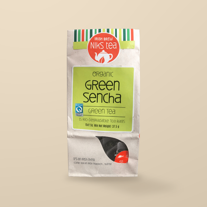 Niks Tea Organic Green Sencha Tea – 15 Tea Bags original product packaging on warm beige studio background