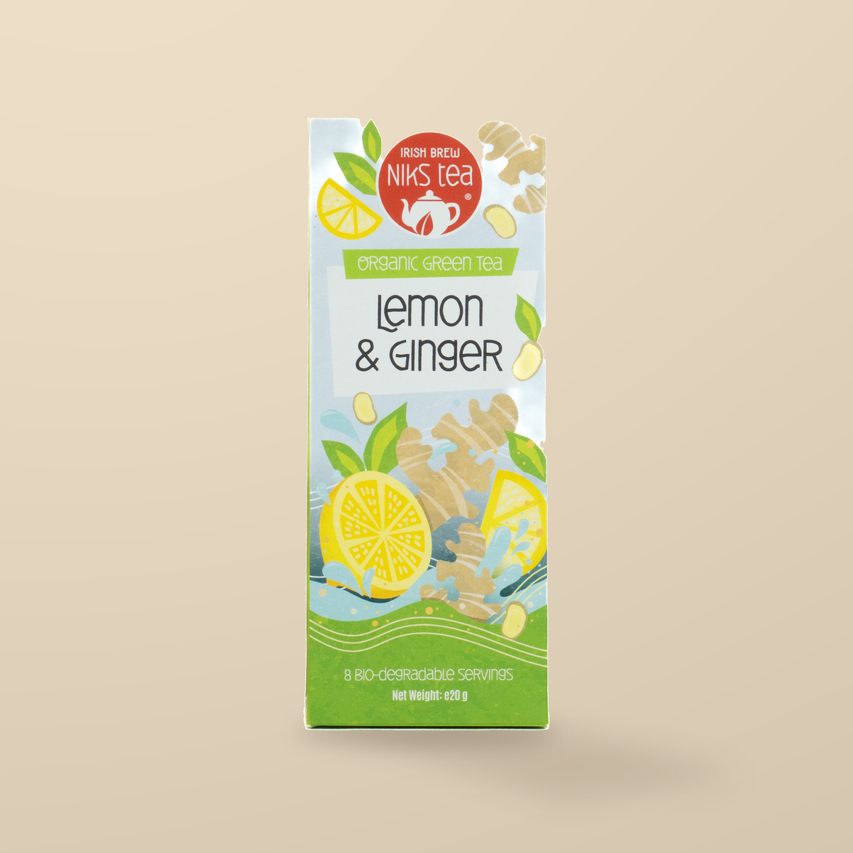 Niks Tea Organic Lemon & Ginger Green Tea – 8 Tea Bags original product packaging on warm beige studio background
