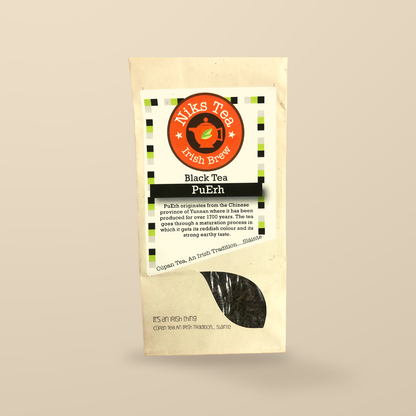 Niks Tea Organic Pu Erh Black Loose Tea – 80g original product packaging on warm beige studio background