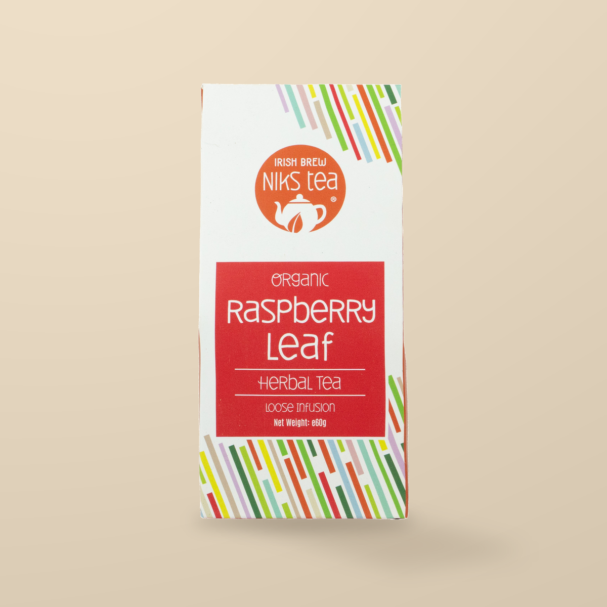 Niks Tea Organic Raspberry Leaf Herbal Loose Tea – 60g original product packaging on warm beige studio background