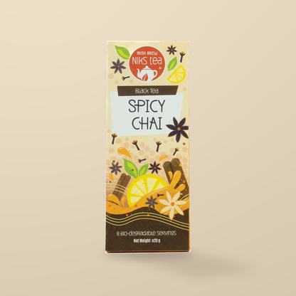 Niks Tea Spicy Chai Black Tea – 8 Tea Bags original product packaging on warm beige studio background