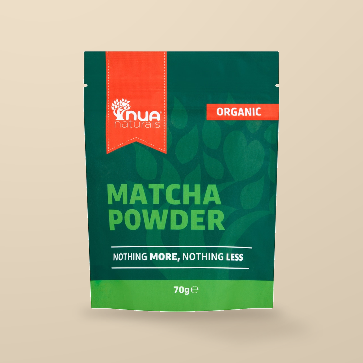 NUA Naturals Organic Matcha Powder 70g — original product packaging on warm beige background
