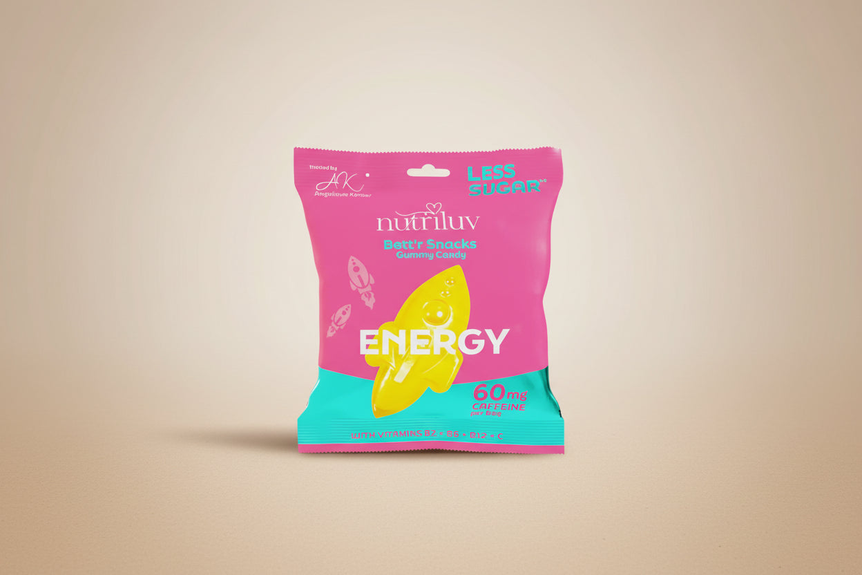 Pink and teal package of NutriLuv energy snacks with a yellow candy on a white background
