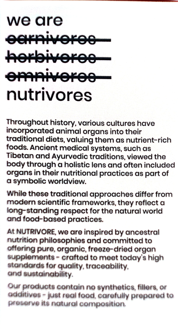 A close-up of printed text on a white background, with the heading 'we are carnivores herbivores omnivores nutrivores' in black horizontal bars. Below, paragraphs describe traditional diets and nutrition-related concepts, including Tibetan and Ayurvedic traditions and NUTRIVORE.