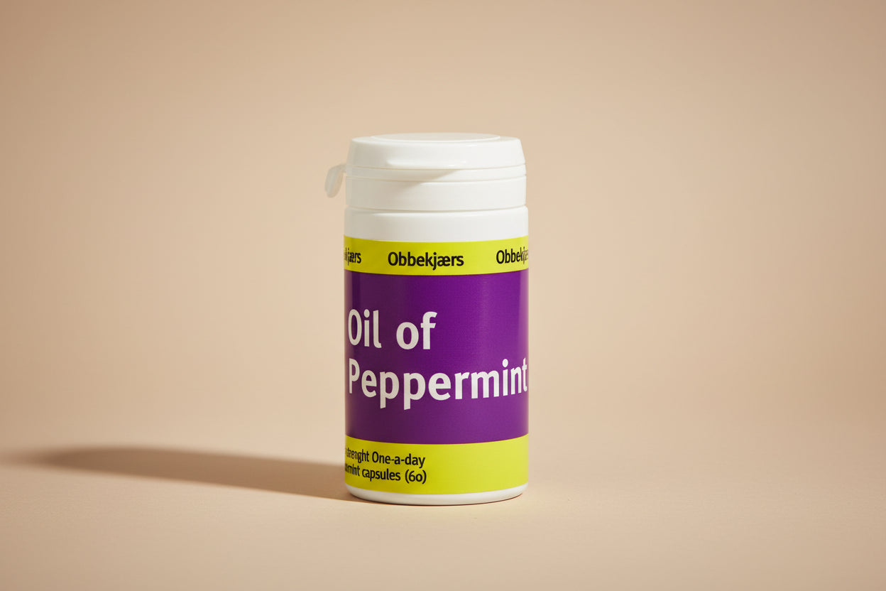 Bottle of Oil of Peppermint capsules with purple label on a white background