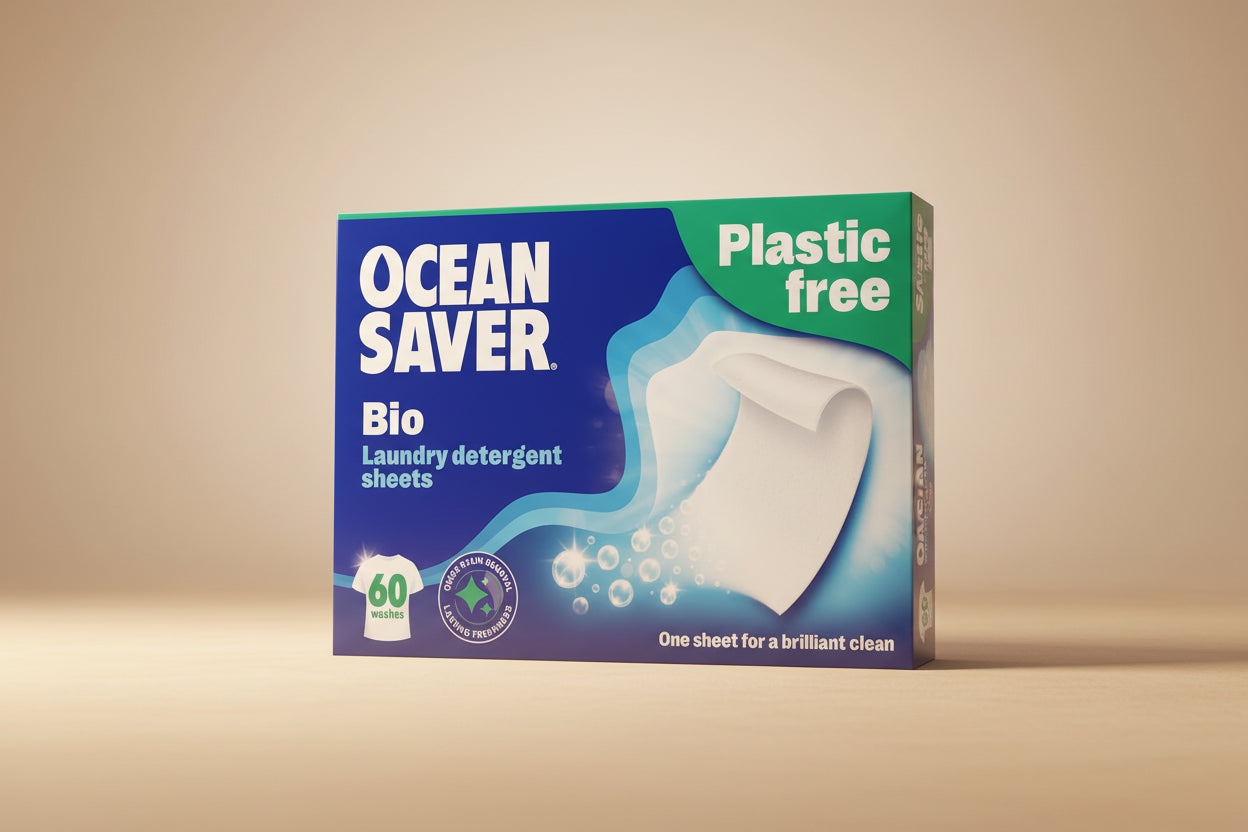 Box of Ocean Saver laundry detergent sheets on a blue background