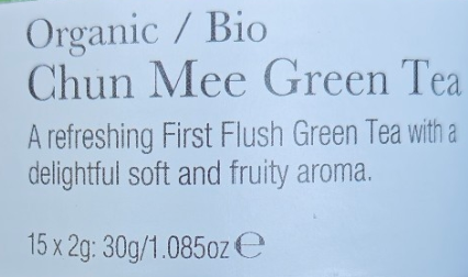 Tea packaging label for Organic Chun Mee Green Tea with text describing the tea.