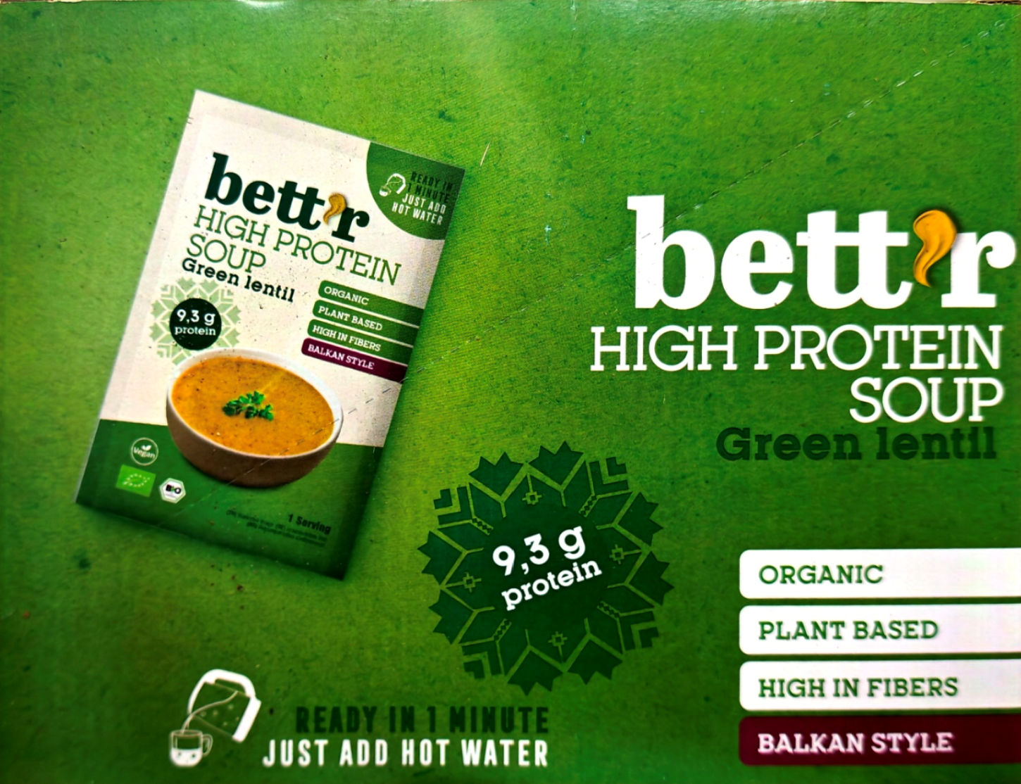 A package of Better High Protein Soup Green Lentil shown on a textured green background with product information text and badges.