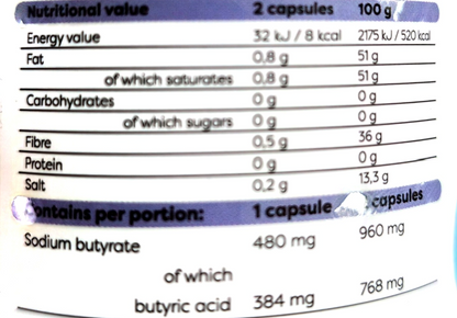 Close-up of a supplement label showing nutritional information and dosage details for sodium butyrate and butyric acid, with text indicating 2 capsules at 100 g and 1 capsule portion.