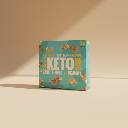 Box of Pulsin' Keto Choc Fudge & Peanut bars on a light blue background