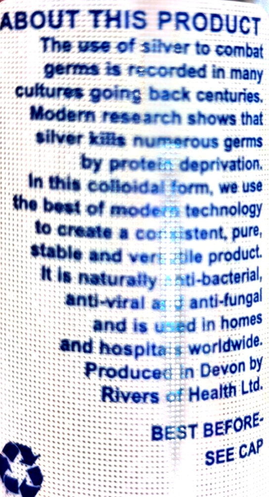 A close-up of a white product package showing blue printed text about the product and usage information, including 'ABOUT THIS PRODUCT' and 'BEST BEFORE SEE CAP'.