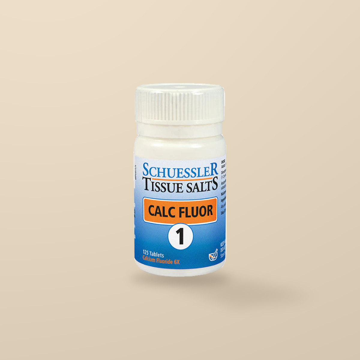 Schuessler Tissue Salts No. 1 Calc Fluor 125 Tablets — original product packaging on warm beige background
