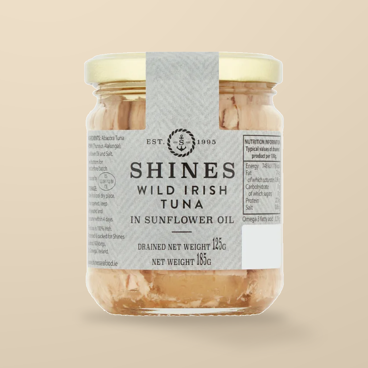 Shines Irish Albacore Tuna in Sunflower Oil – 185g — original product packaging on warm beige background