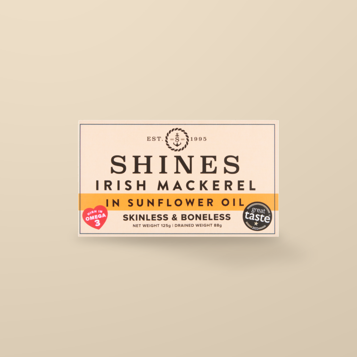 Shines Irish Mackerel Fillets in Sunflower Oil – 125g — original product packaging on warm beige background