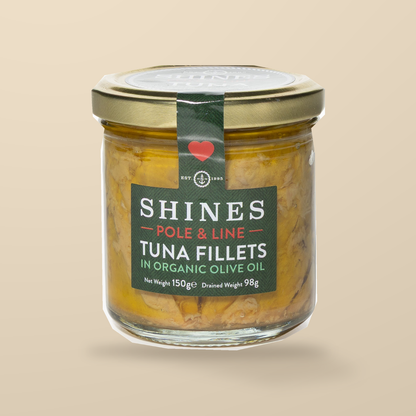 Shines Skipjack Tuna in Organic Extra Virgin Olive Oil – 150g — original product packaging on warm beige background