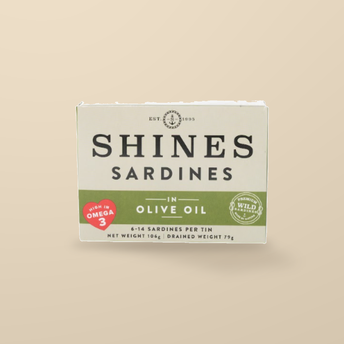 Shines Wild Irish Sardines in Olive Oil – 106g — original product packaging on warm beige background