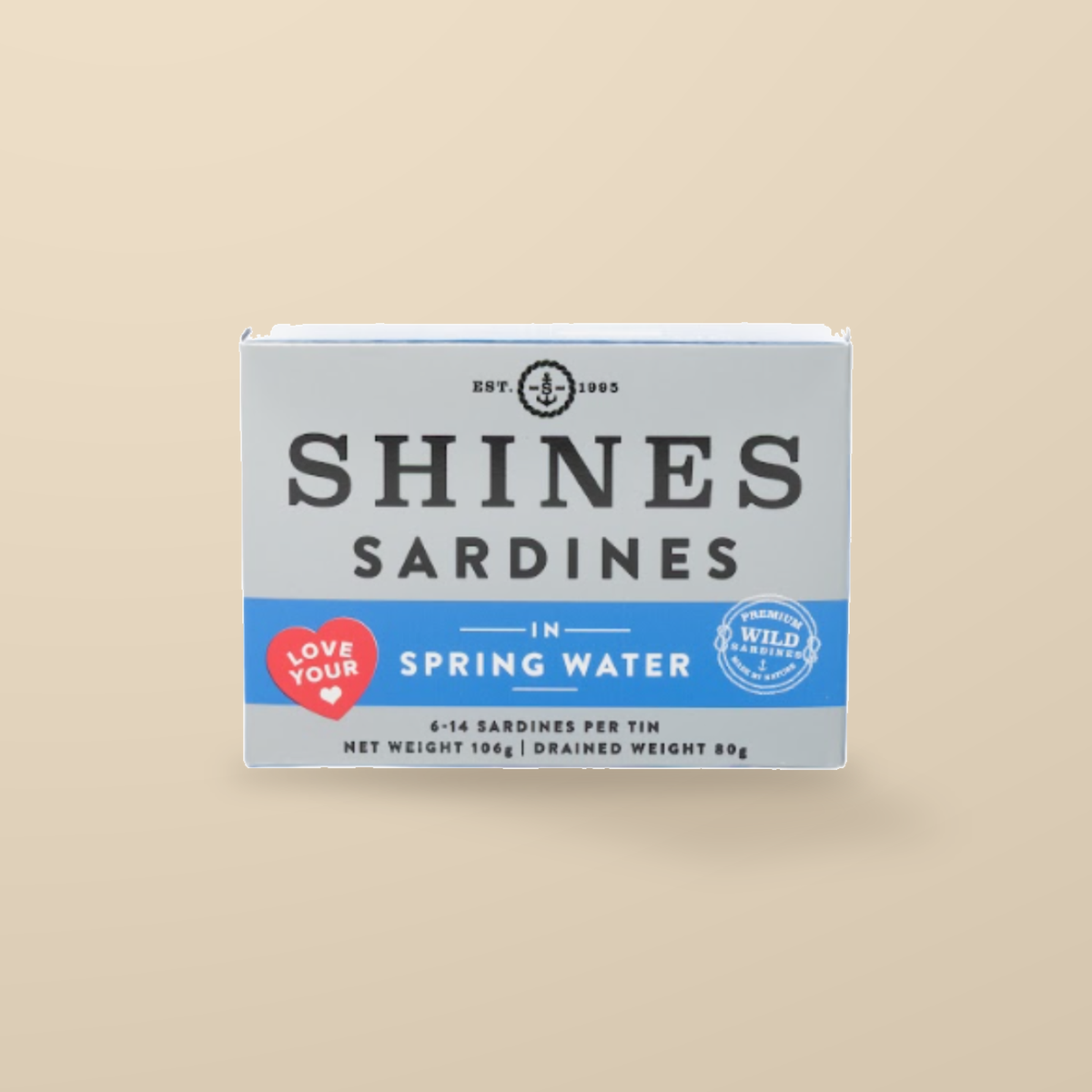 Shines Wild Irish Sardines in Spring Water – 106g — original product packaging on warm beige background