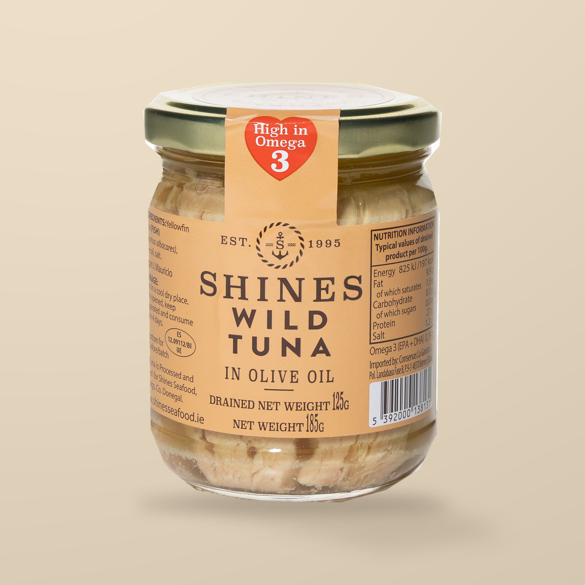 Shines Yellowfin Tuna in Olive Oil – 185g — original product packaging on warm beige background