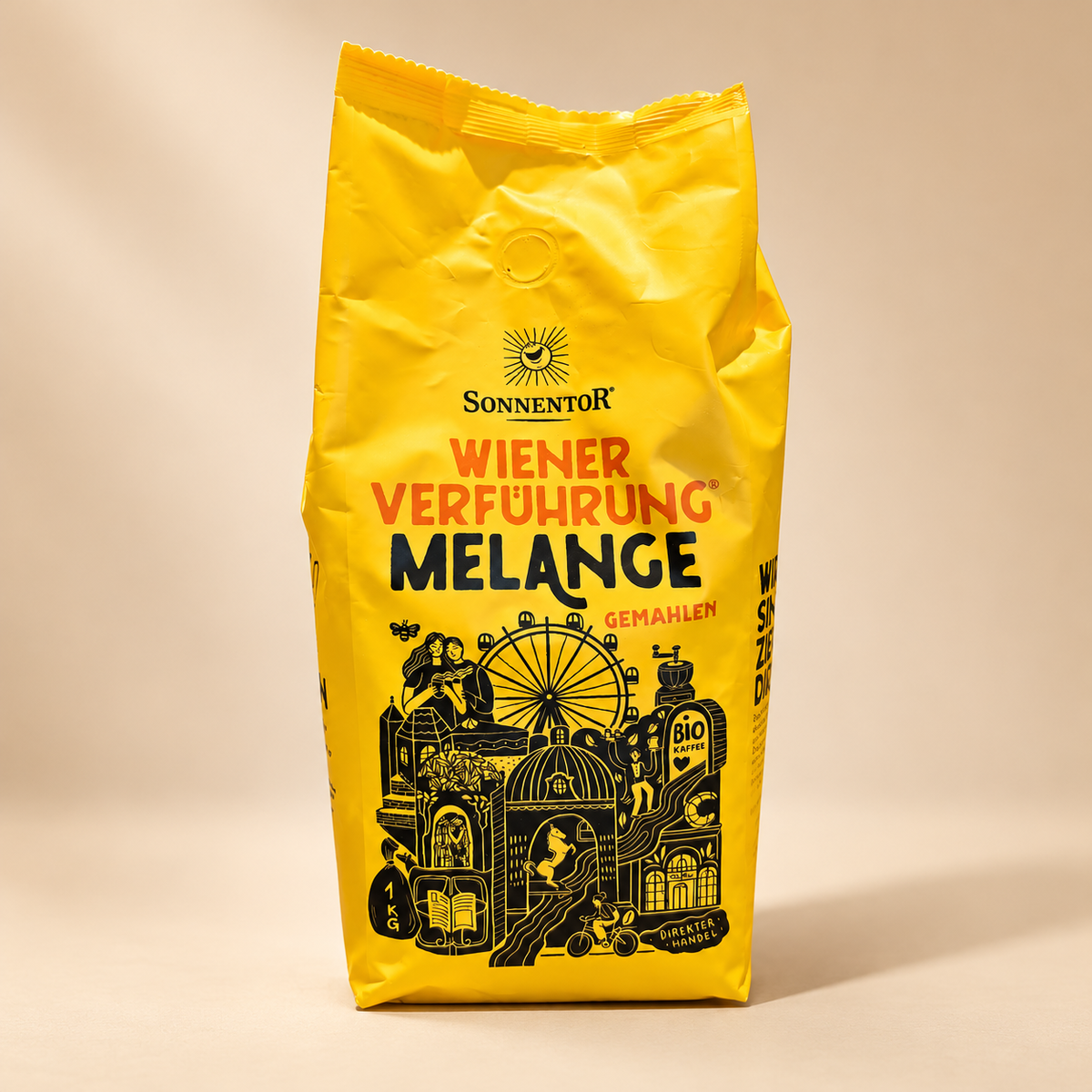 Sonnentor Viennese Melange Ground Coffee 1kg yellow bag on warm beige studio background