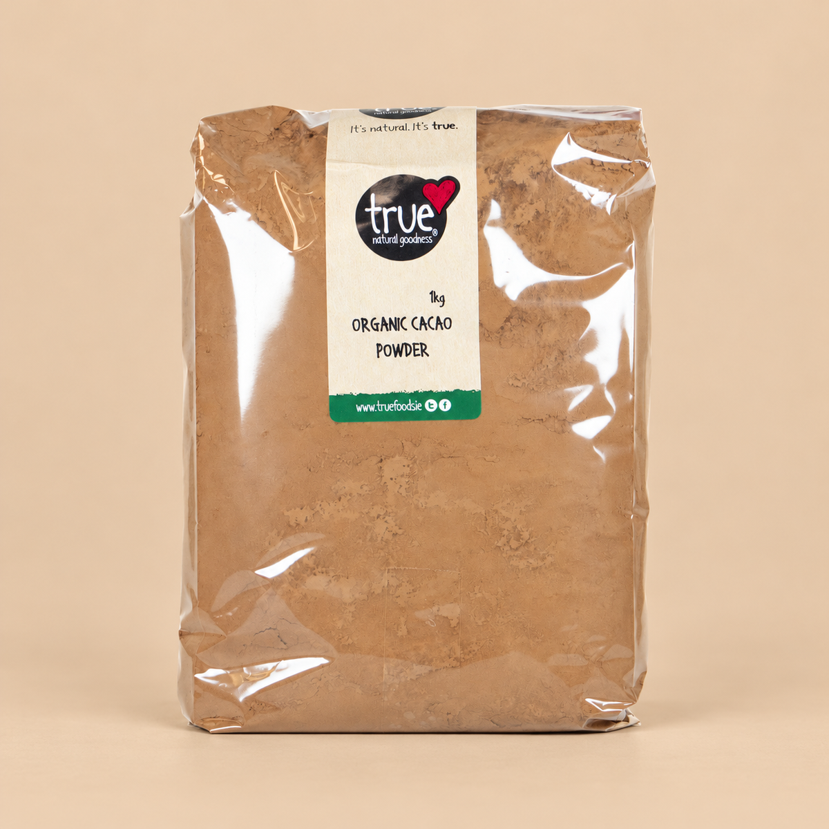 True Natural Goodness Organic Cacao Powder – 1kg product pack on beige background
