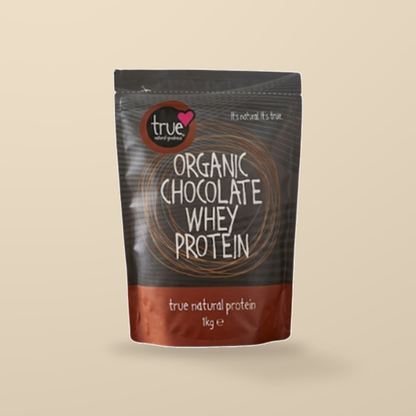 True Natural Goodness Organic Chocolate Whey Protein – 1kg — original product packaging on warm beige background