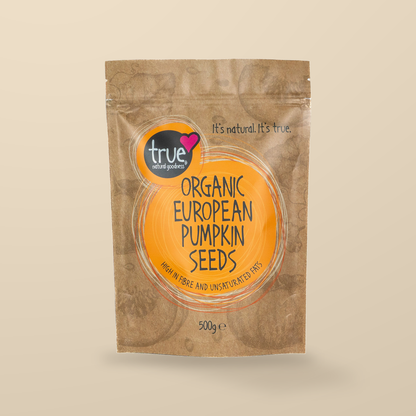 True Natural Goodness Organic European Pumpkin Seeds – 500g — original product packaging on warm beige background