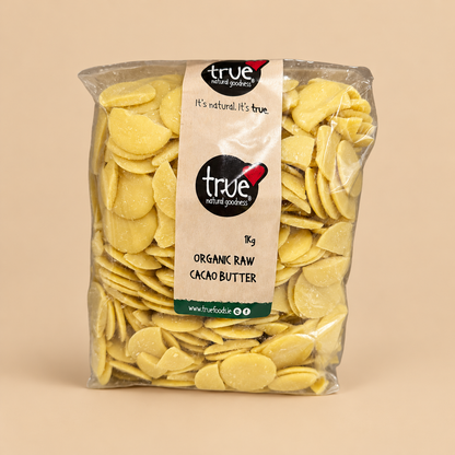 True Natural Goodness Organic Raw Cacao Butter – 1kg product pack on beige background