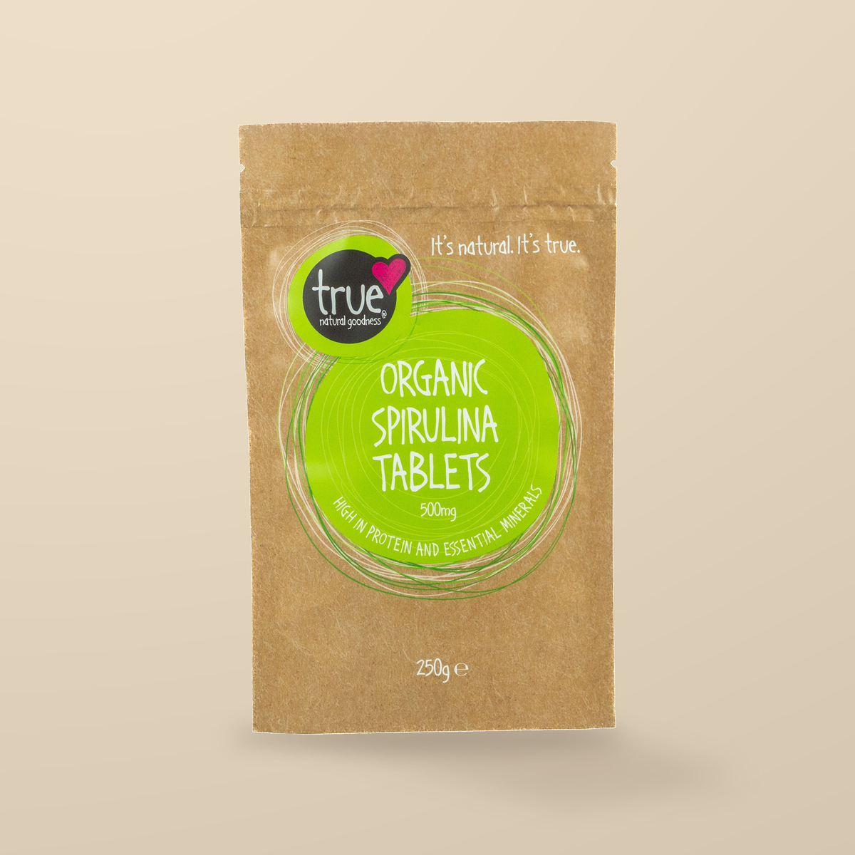 True Natural Goodness Organic Spirulina 500mg – 500 Tablets / 250g — original product packaging on warm beige background